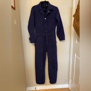 Long sleeve navy jumpsuit by Big Bud Press in size small.